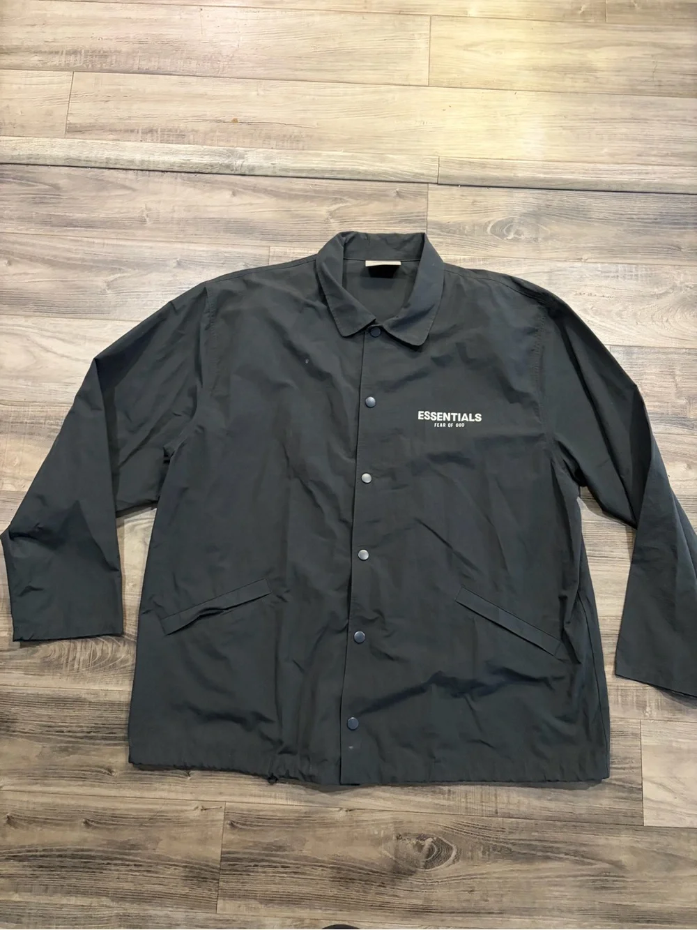 Fear of God Essentials BlacFear of God Essentials Black Nylon Windbreaker Jacket
